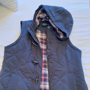 Blue hooded vest.